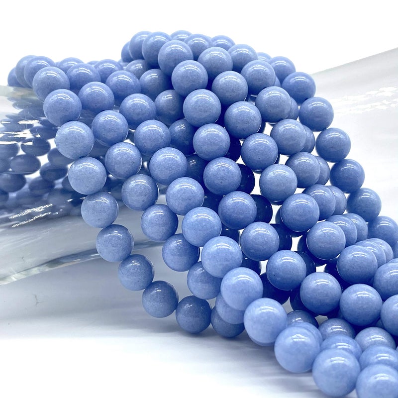 ABC GEMS USA ABCGEMS Glow-in-Dark Mexican Blue Aragonite Beads (AKA Cave Calcite- Extremely Rare) Healing Crystal Chakra Energy Stone Ideal for Bracelet Necklace Ring DIY Jewelry Making Smooth Round 10mm - Image 1